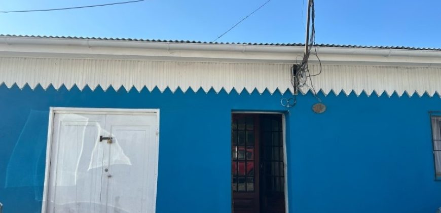 TERRENO CON 3 CASAS CONSTRUIDAS, UN SOLO ROL EN CERRO BARON