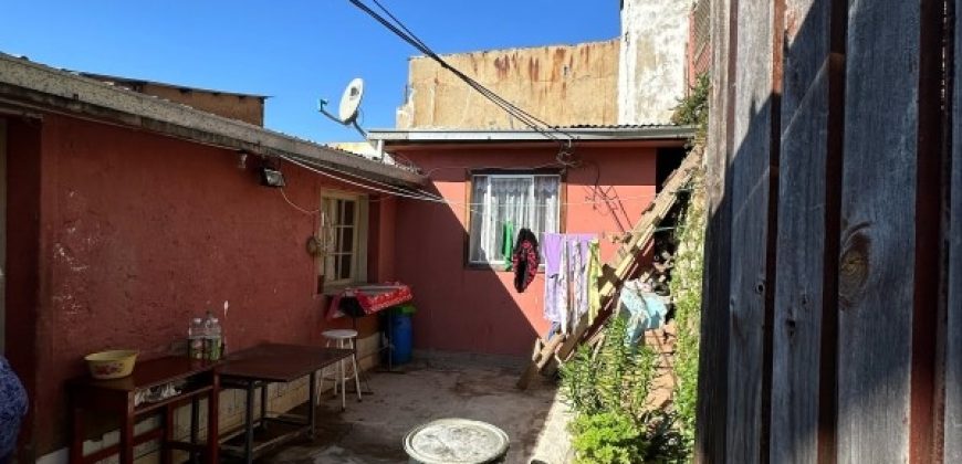 TERRENO CON 3 CASAS CONSTRUIDAS, UN SOLO ROL EN CERRO BARON