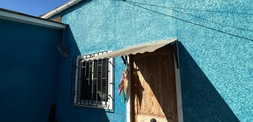 TERRENO CON 3 CASAS CONSTRUIDAS, UN SOLO ROL EN CERRO BARON