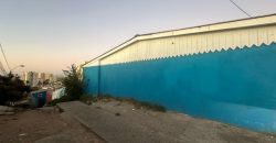 TERRENO CON 3 CASAS CONSTRUIDAS, UN SOLO ROL EN CERRO BARON